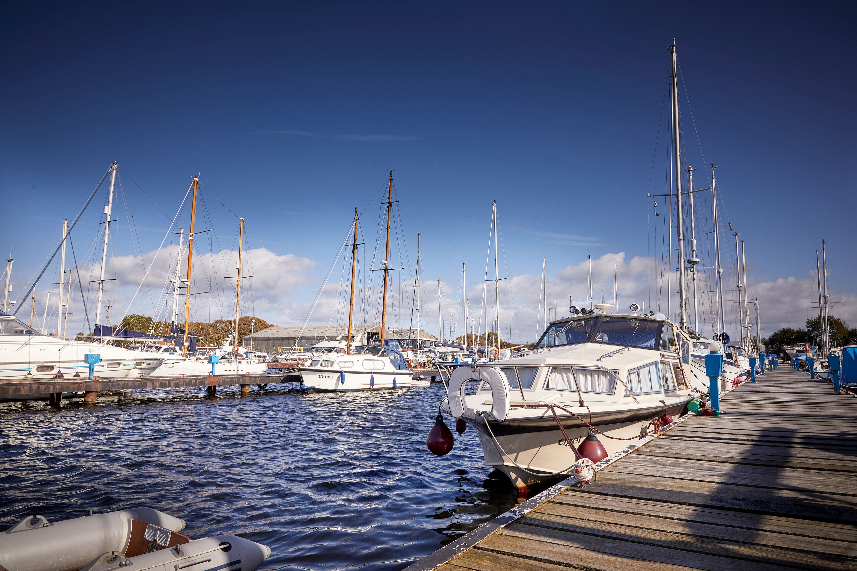 Boats moored on jetties at Glasson 